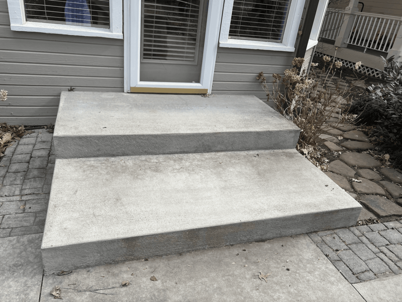 Empty back concrete steps on a home.
