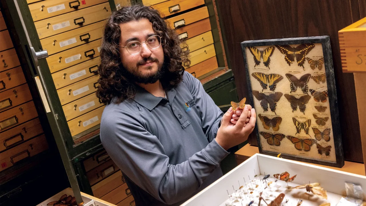 Max holding a butterfly